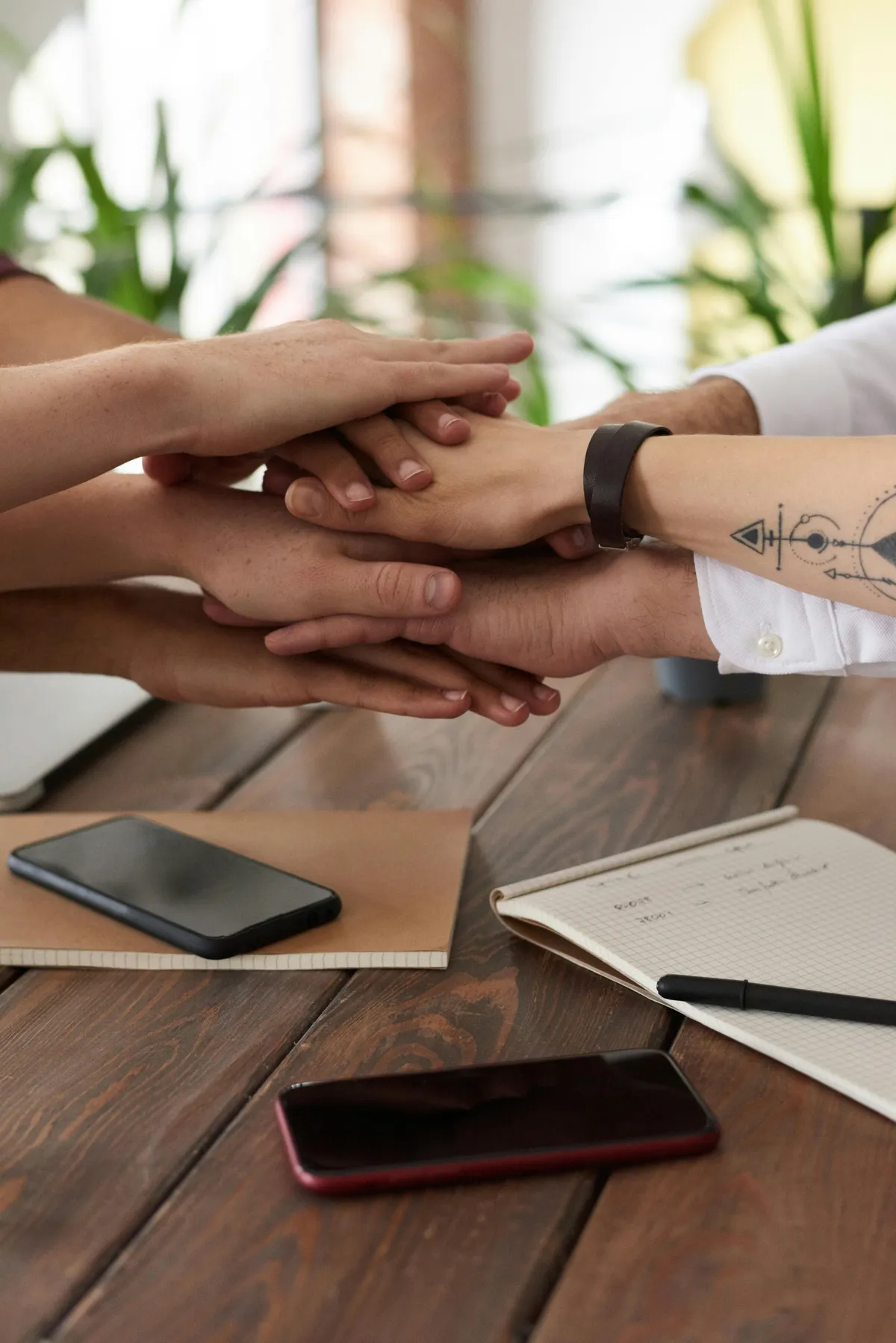 team gathering hands